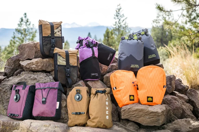 5 BikePacking Pack Makers Adopt Old Man Mountain's Flip QR Cage & Bag Mount